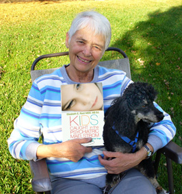 Betsy with therapy dog, Leo